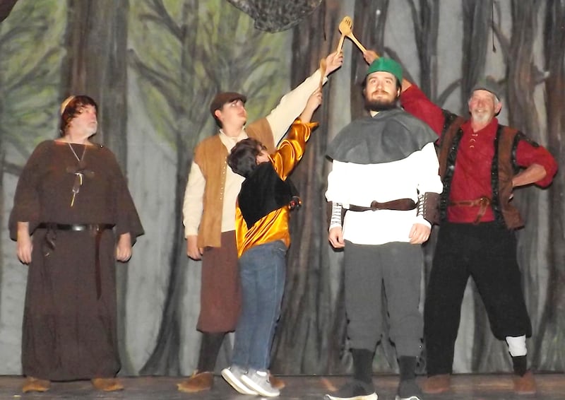Polo Area Community Theatre is in rehearsals for "The Somewhat True Tale of Robin Hood", an action packed, silly adaptation that will be presented in May at the former Polo Town Hall, 117 N. Franklin Ave. Here, Friar Tuck looks on as Little John, Allan Adale, and Will Scarlet cheer on Robin Hood.