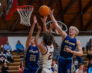 Photos: Marquette dominates Henry-Senachwine in boys basketball