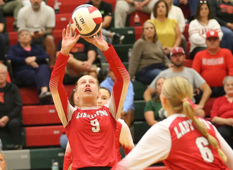L-P's Aubrey Urbanski sets the ball in the air for teammate Maggie Boudreau on Tuesday, Oct. 7, 2025 in Sellett Gymnasium at L-P High School.