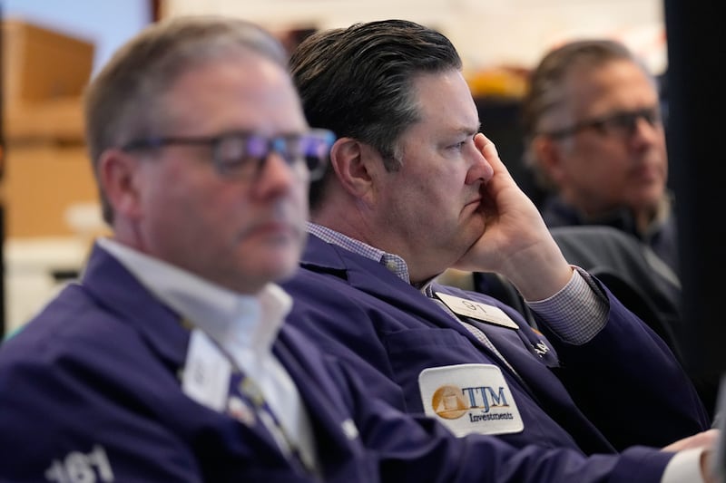 Terrance McCauley works on the floor at the New York Stock Exchange in New York, Tuesday, April 7, 2026. (AP Photo/Seth Wenig)