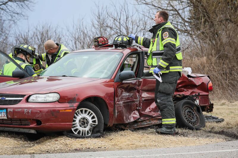Woodstock Fire/Rescue District firefighters extricated the sedan driver within 10 minutes after a crash with a semi-truck on Thursday, March 27, 2025 at the intersection of Route 120 and North Queen Anne Road in Woodstock.