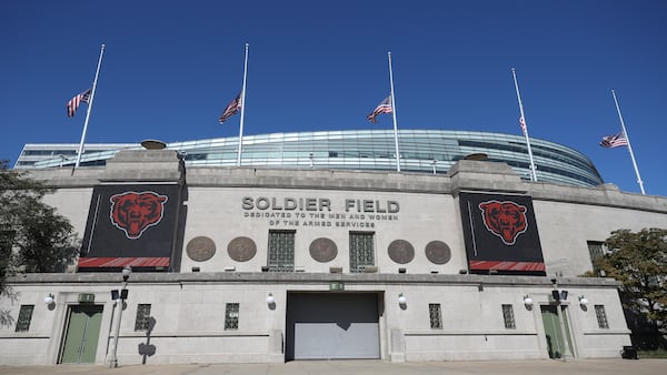 Eye On Illinois: Football team needs money? Try license plates and lotto tickets