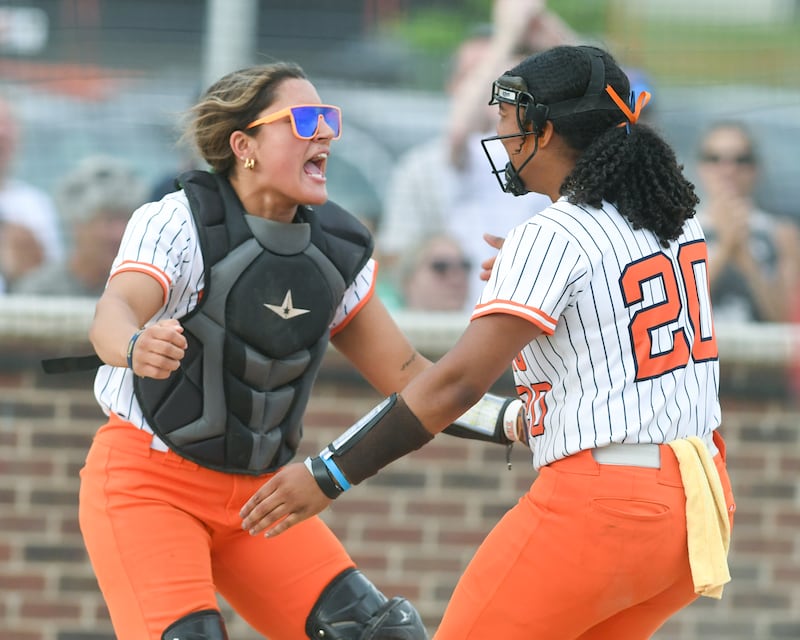 Oswego teammates Kiyah Chavez, left, and Jaelynn Anthony hug after taking a win over Yorkville on Tuesday June 3, 2025, during the sectional semifinal game held at Oswego High School.