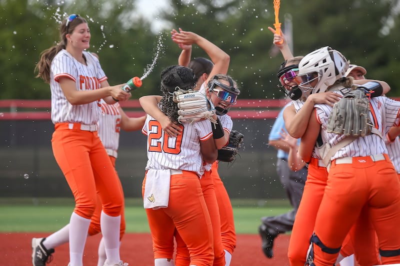 Oswego celebrates the win over Plainfield East in their Class 4A Yorkville Sectional final softball title game. May 29, 2026 in Yorkville.