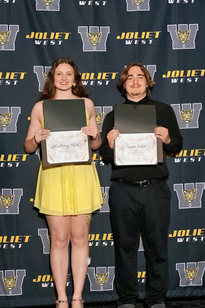 Calloway Walsh and Payton Palesh hold their certificates after being named 2026 Mr. and Ms. Alpha Omega at Joliet West High School's Senior Awards on May 6. The award recognizes the school's most distinguished graduating seniors for academic excellence, leadership, and service to the community.