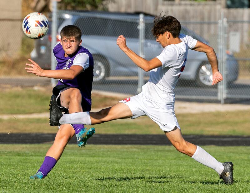 Dixon’s Cameron Foulker boots the ball against Oregon’s Ivan Hernandez Monday, Sept. 29, 2025.