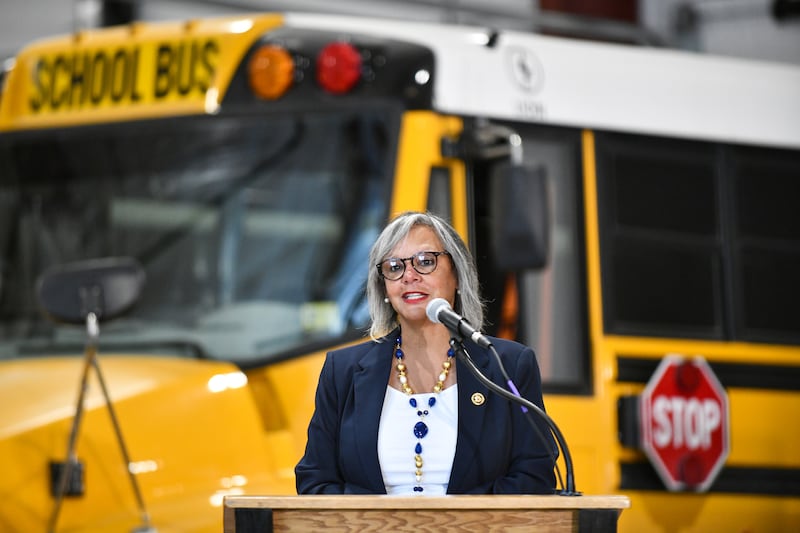U.S. Rep. Robin Kelly speaks at Herscher High School during an open garage event to unveil the Herscher School District's new facility and 25 new electric buses on Oct. 7, 2024.