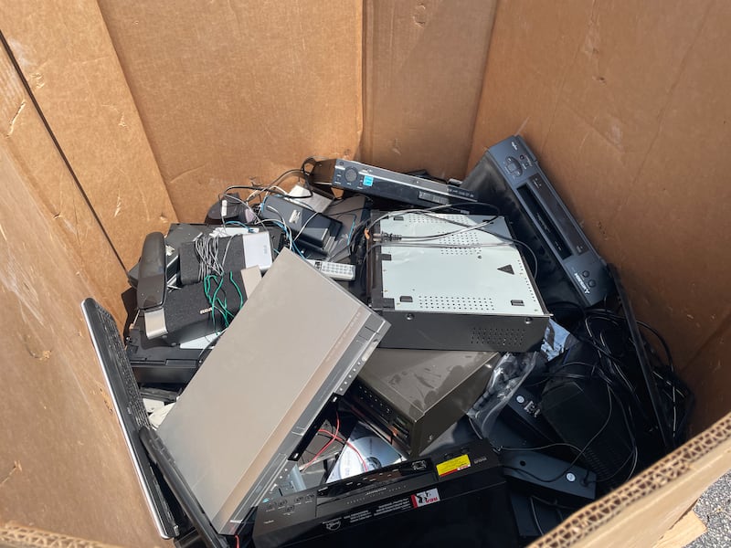 A box holds electronic devices that were dropped off at State Rep. Stephanie Kifowit’s, D-Oswego, 12th annual Community Recycle & Shred Day in Aurora on July 13, 2024.