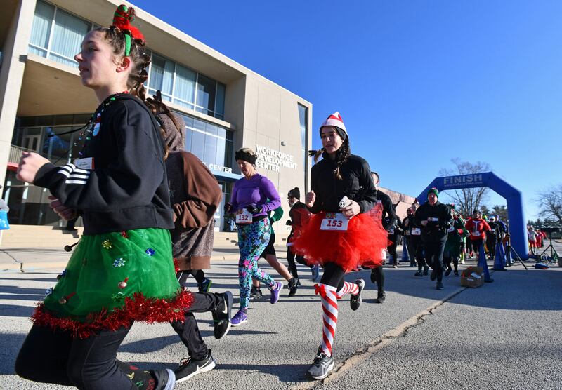 Dressed as an elf, Kelly O’Connor, 14, of Kankakee, begins running in the 32nd annual Jingle Bell Run at Kankakee Community College. The event returns to the college on Sunday.