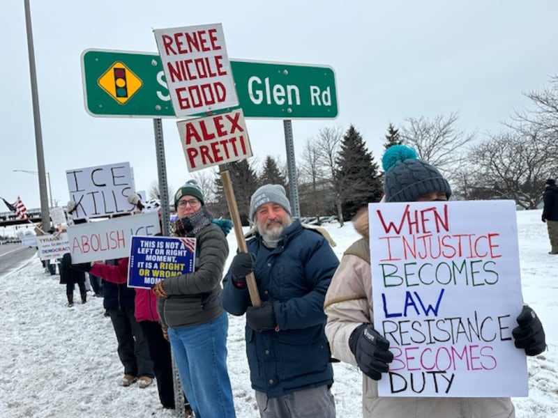 Protesters gather in South Elgin on Jan. 25 following the fatal shooting of Alex Pretti in Minnesota by federal immigration officers.