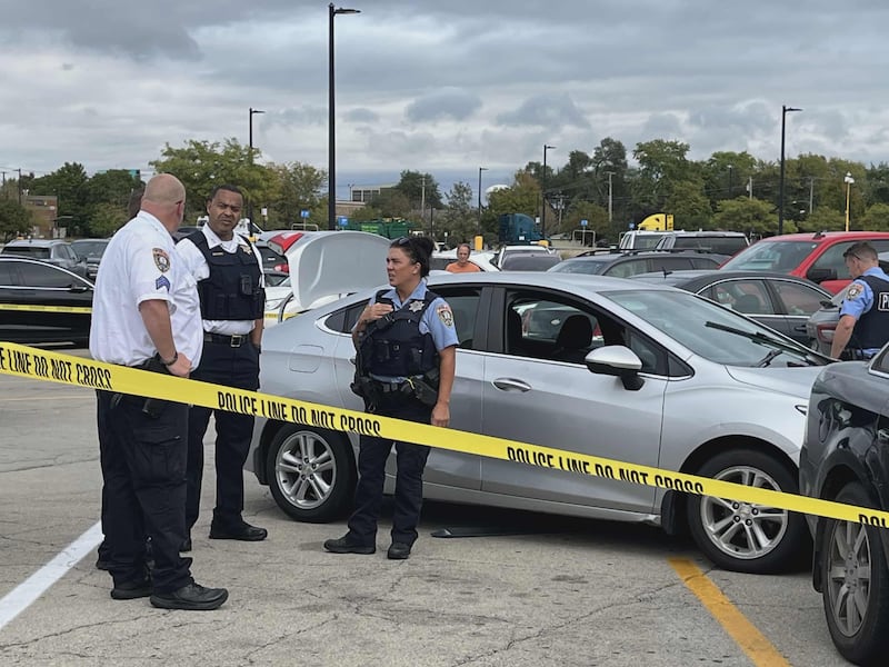 Joliet police officers at the parking lot of Walmart, 2424 W. Jefferson St., on Tuesday, Oct. 7, 2025.