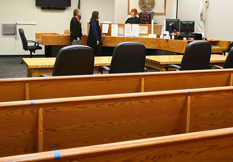 Judge Cynthia Raccuglia, speaks with drug court coordinators Maranda Johnson and Selenia Arteaga in the courtroom on Wednesday Nov. 3, 2021 at the La Salle County Government Complex in Ottawa. The program began in April 2020. The program currently has six individuals that are enrolled. To qualify for the drug court program, you need a referral from an attorney and be convicted of a specific felon. In addition, there is a drug court act that clarifies what is acceptable and what isn’t. A risk assessment is also conducted. The program is grant funded.