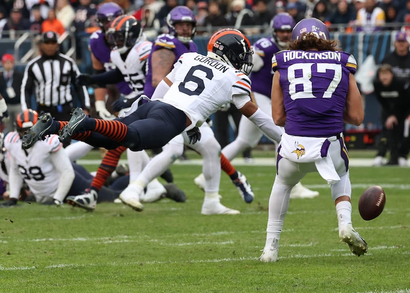 Chicago Bears cornerback Kyler Gordon knocks the ball away from Minnesota Vikings tight end T.J. Hockenson during their game Sunday, Nov. 24, 2024, at Soldier Field in Chicago.