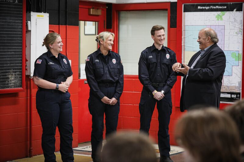 John Cederlund, far right, thanks Marengo Fire & Rescue Districts firefighters at the ceremony on May 28, 2025.