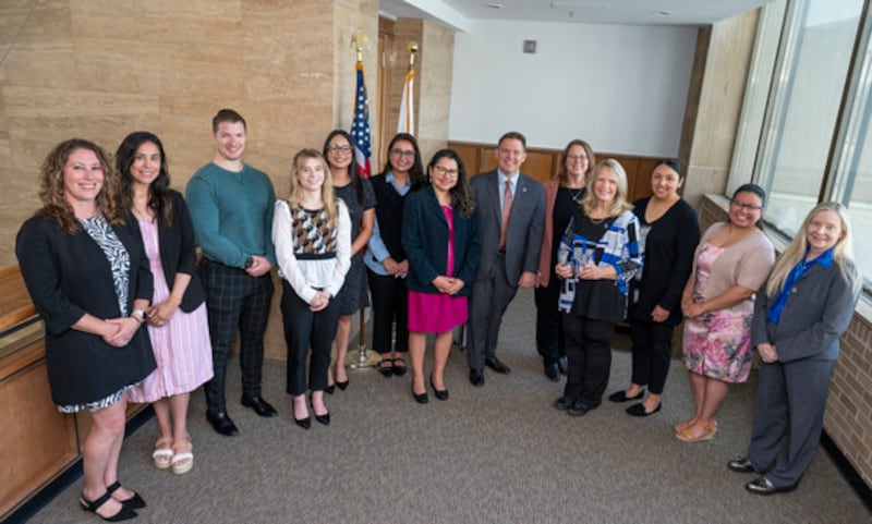 Jacquelyn Reidy (from left), Melissa Cisneros, Brandon Mabrey, Maggie Sarauer, Maria Villareal, Zaira Herrera, Jacqueline Herrera Giron, Eric Rinehart, Melissa Burke, Jennifer Bishop Jenkins, Susana Perez, Vanessa Vargas Ramirez and Kim Clark.