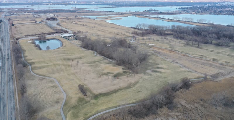 An aerial view of the Lost Marsh Golf Course looking west toward Wolf Lake Memorial Park on Saturday, Feb. 21, 2026 in Hammond, Ind. The Lost Marsh Golf Course near 129th Street and Calumet Avenue, is one of the sites that was evaluated by the Chicago Bears for a potential stadium located about 18 miles southeast of Soldier Field. The golf course was built on a former industrial landfill. Oil refineries and a residential neighborhood are located close to the golf course.