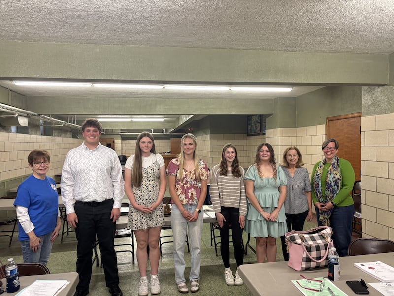 Winners of the 2025 American Legion Americanism Essay Contest stand with members of the Ottawa American Legion post following the awards presentation. The annual contest encourages students to explore patriotic themes through writing.