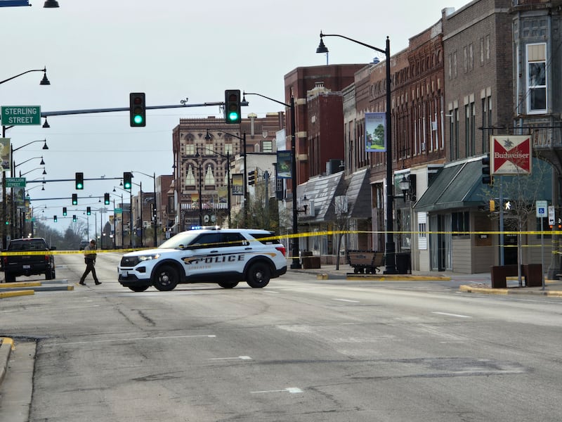 Police close off the intersection of Sterling and Main streets on Sunday, April 20, 2025, to investigate a shooting.