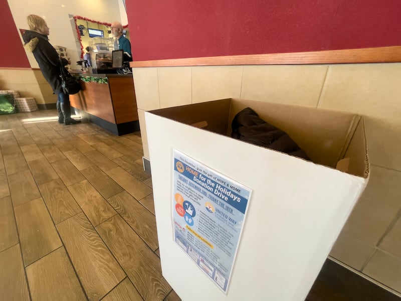 Coats fill a donation bin for the United Way's Home for the Holiday's Donation Drive at the Wendy's in Bourbonnais on Tuesday, Dec. 16, 2025. The drive runs through Friday Dec. 19.