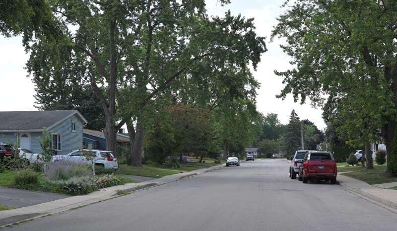 The 1200 block of Navajo Drive in Carpentersville, shown on Aug. 14, 2025, is where authorities said three people were shot as they sat in the car in a driveway the evening before.