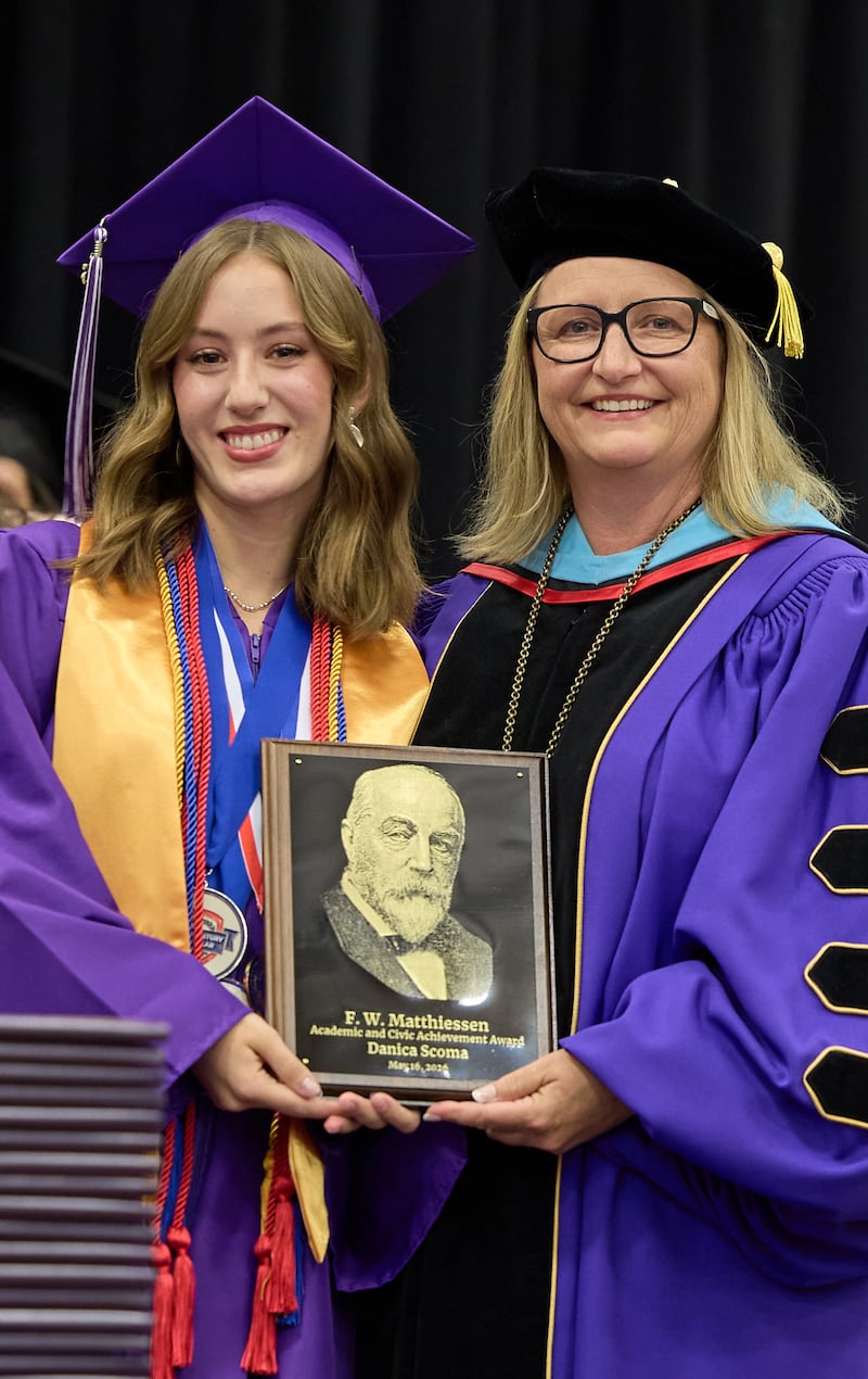Illinois Valley Community College president Tracy Morris presenting the F.W. Matthiessen Award to Danica Scoma