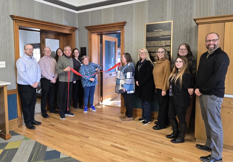 Members of the library and chamber meet for a ribbon cutting ceremony for the new sewing room at Streator Public Library. (From left) Derek Barichello, Streator Chamber director; Ben Hiltabrand, Chamber board president; Beth Palm, Chamber board and ambassador member; Greg Tullis, Streator Rotary Club; Laura Mattson, Chamber ambassador; Barb Ehling, Streator Rotary Club; Melissa Badger, director of Streator Public Library; Sandy Austin, Streator Public Library Board; Judy Booze, Chamber ambassador/Rotary Club; Nicole Close, Streator Public Library; Charlotte Badger, Streator Public Library; and Jeffrey Alstadt, Rotary Club.