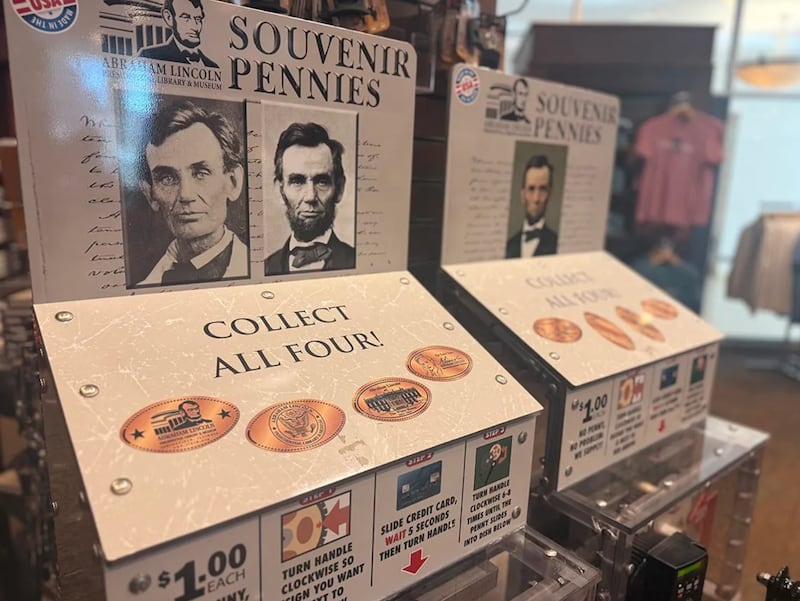 The gift shop at the Abraham Lincoln Presidential Museum has a printed guide for customers explaining how its penny rounding system works.