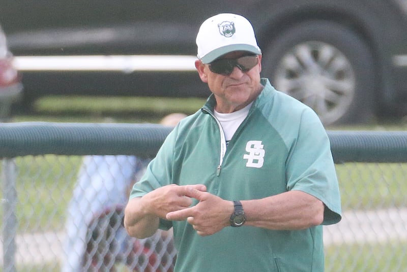 St. Bede head baseball coach Bill Booker coaches his team against Bureau Valley on Wednesday, May 14, 2025 at St. Bede Academy.