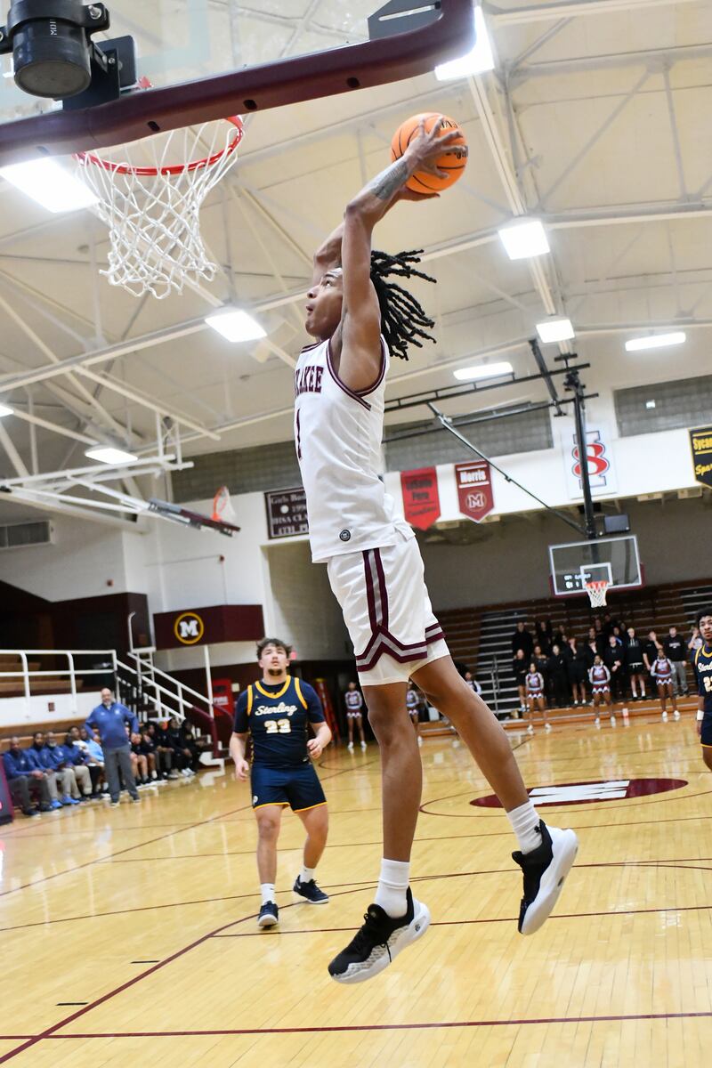 Kankakee's Lincoln Williams slam dunks the ball during the Kays' 85-50 victory over Sterling in the IHSA Class 3A Morris Regional championship on Friday, Feb. 28.