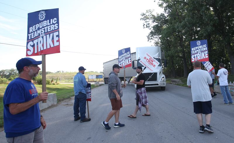 Workers with Republic Services and Teamsters Local 179 picket in front of a semi along the south entrance to Republic Services on Wednesday, July 2, 2025 in Ottawa. The strike involves 25 employees at Republic Services at the Otawa facility. 
The action will disrupt waste collections for tens of thousands of residents throughout LaSalle County. Republic Teamsters are demanding a contract with improved wages, better benefits, and stronger labor protections. The Illinois strike comes after 450 Republic Teamsters in Boston went on strike on Tuesday. Hundreds of additional Teamsters across the country are having similar contract disputes with Republic.