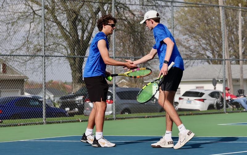 Princeton's Asa Gartin (left) and Jackson Mason celebrate a point in their No. 1 doubles match against Ottawa on Monday.