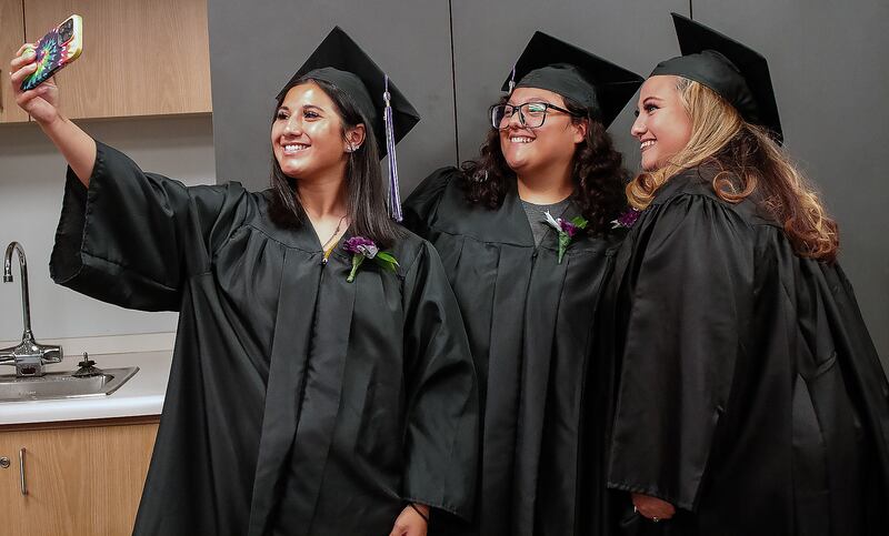 These 2024 graduates make memories as they prepare for IVCC's annual Adult Education Recognition event. This year's 44th annual recognition on Wednesday, May 21, honors students who have completed GEDs, citizenship studies or career pathway programs. Three of the completers will be keynote speakers for the event.