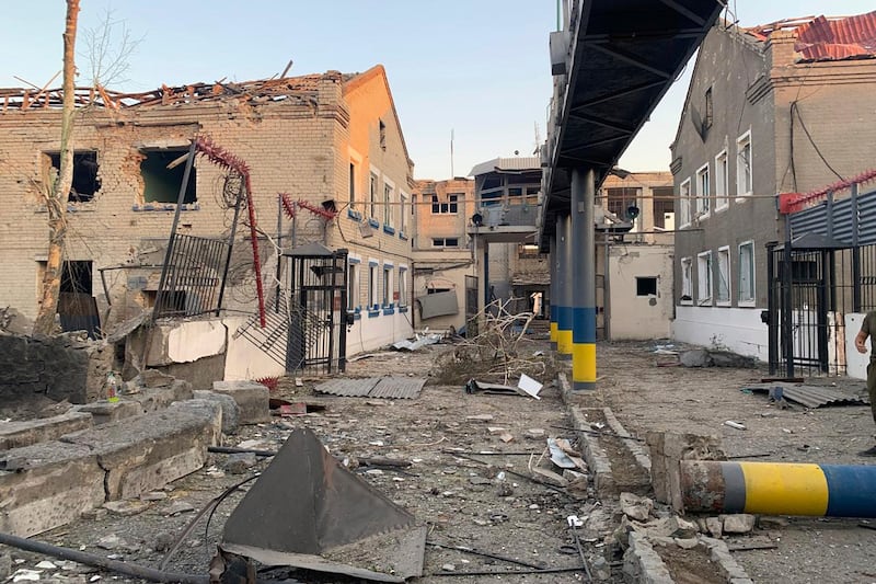 This photo provided by Ukraine's State Criminal Executive Service shows a damaged prison in the village of Bilenke, in Ukraine's Zaporizhzhia region, following a Russian bomb attack that killed at least 17 inmates, on Tuesday, July 29, 2025. (Ukraine's State Criminal Executive Service via AP)