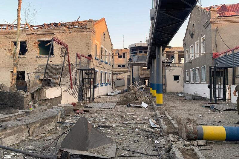 This photo provided by Ukraine's State Criminal Executive Service shows a damaged prison in the village of Bilenke, in Ukraine's Zaporizhzhia region, following a Russian bomb attack that killed at least 17 inmates, on Tuesday, July 29, 2025. (Ukraine's State Criminal Executive Service via AP)