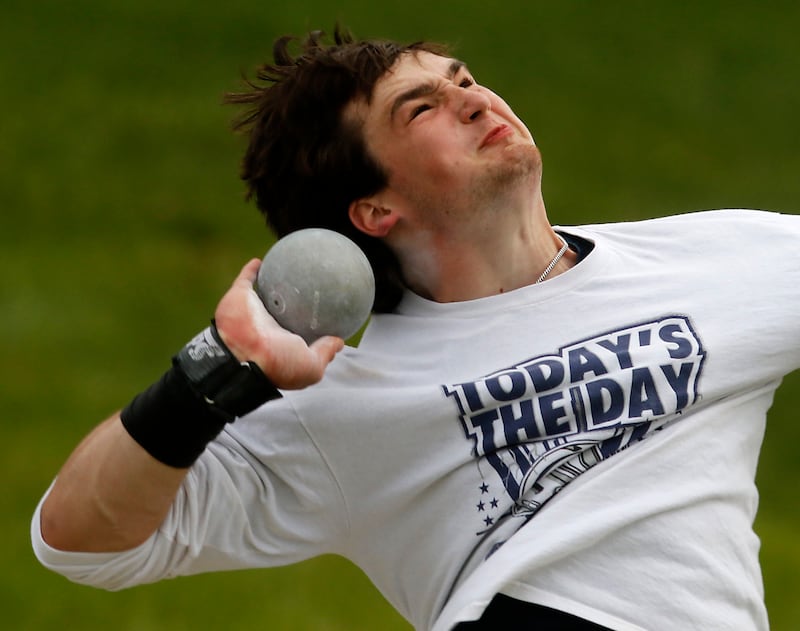 Cary-Grove’s Logan Abrams throws the shot putt during the Huntley IHSA Class 3A Boys Sectional Track and Field Meet on Thursday, May 22, 2025, at Huntley High School.