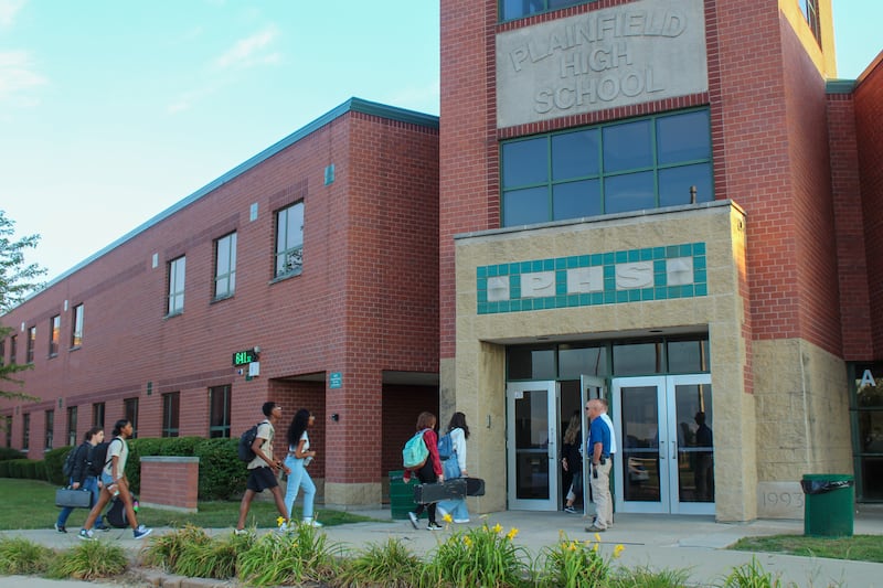 Plainfield High School-Central Campus students stream into the building on the first day of school on Thursday, August 18, 2022.