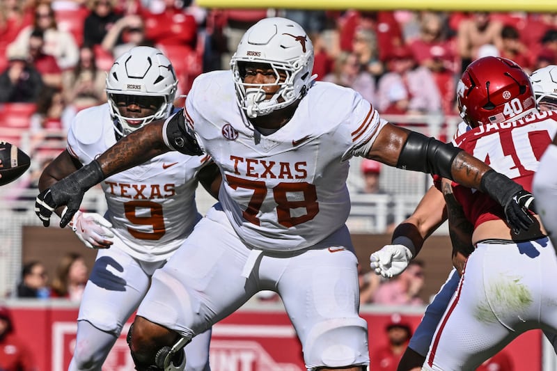 FILE - Texas offensive lineman Kelvin Banks Jr. (78) sets up to block against Arkansas during the first half of an NCAA college football game Saturday, Nov. 16, 2024, in Fayetteville, Ark. (AP Photo/Michael Woods, File)