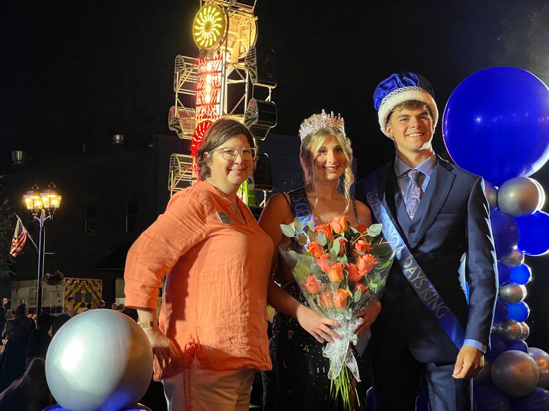 Genoa Area Chamber of Commerce executive director Krissy Johnson stands with Abby Fellows and John Swinehearts, the winners of the 2025 Genoa Days King and Queen Scholarship Contest on May 28, 2025.
