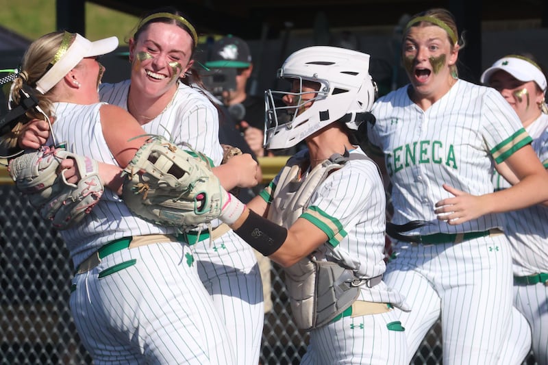 Members of the Seneca softball team (from left) Camryn Stecken, Hayden Pfeifer, Lexie Buis, and Tessa Krull react after defeating Brimfield 3-0 in the Class 2A Supersectional on Monday, June 1, 2026 at the Eastside Centre in East Peoria.