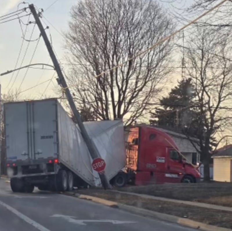 Semi-truck struck power line at the corner of Shooting Park and Pulaski.