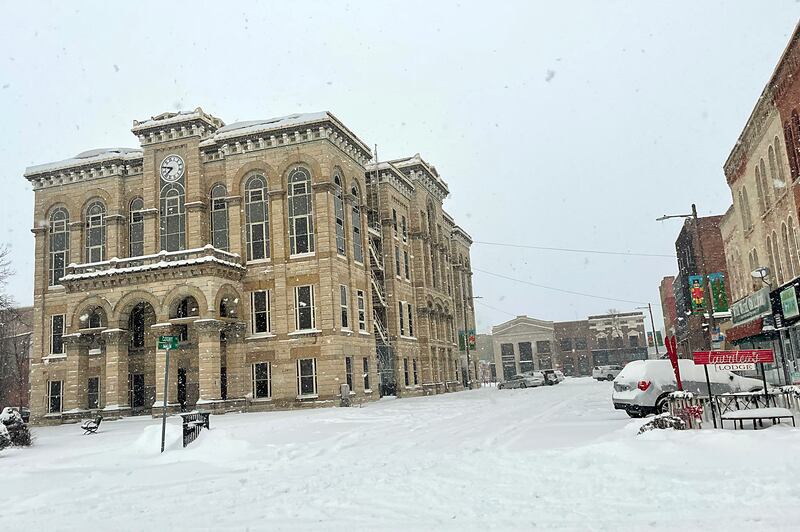 Snow falls outside the La Salle County Courthouse on Wednesday, Feb. 2, 2022, downtown Ottawa.