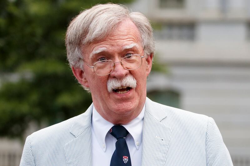 FILE - Then National security adviser John Bolton speaks to media at the White House July 31, 2019, in Washington.  (AP Photo/Carolyn Kaster File)