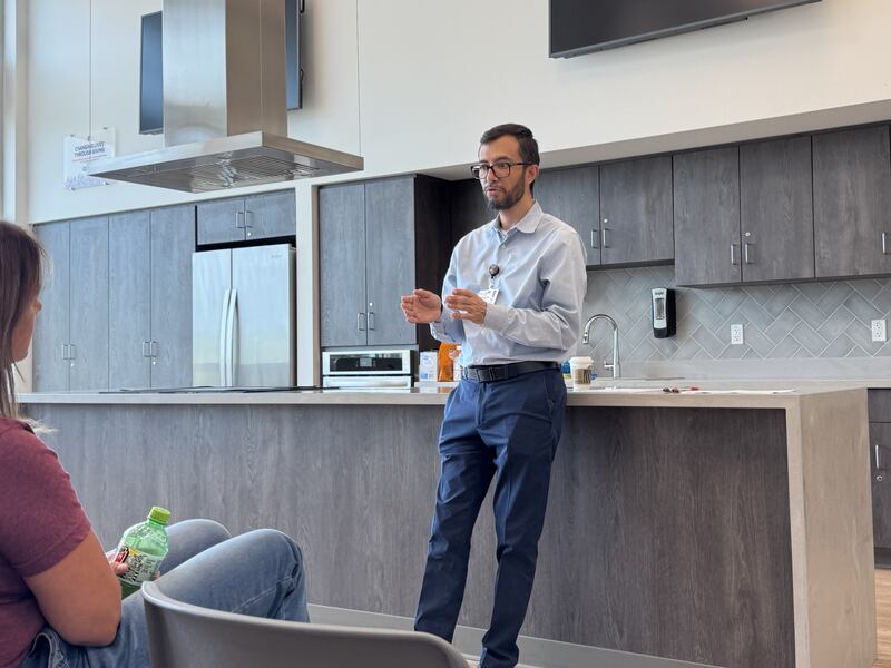 Dr. Isaac Mezo presents in front of a group at the Morris Hospital YMCA on Friday, Sept. 19, 2025.