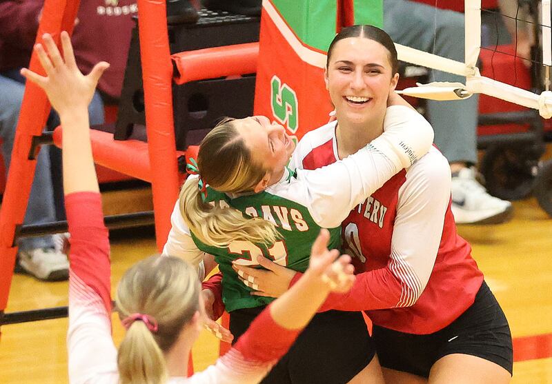 L-P's Karmen Piano celebrates with teammte Anna Riva after defeating Morris in two sets during the Class 3A Sectional semifinal game on Tuesday, Nov. 4, 2025 in Sellett Gymnasium at L-P High School.