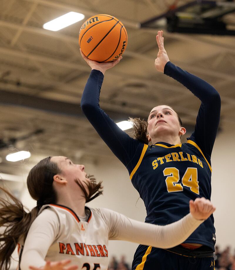Sterling’s Madison Austin puts up a shot late in the game against Washington Monday, March 3, 2025, during the 3A Supersectional at Rochelle High School.
