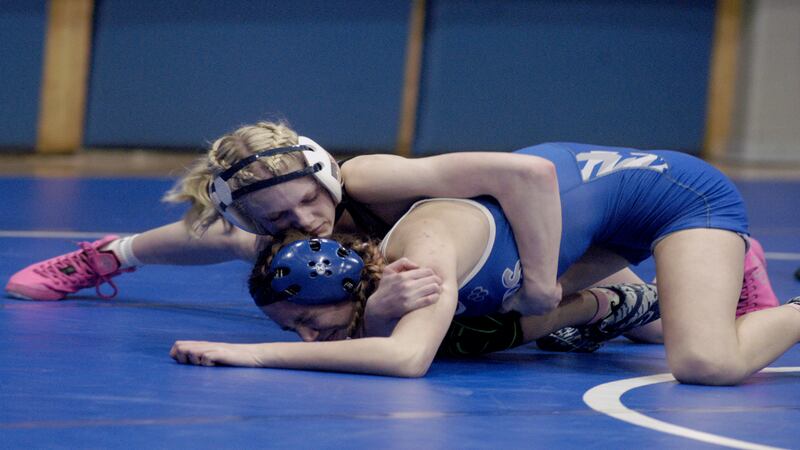 Photos: Wrestling at Newman High School with Newman, Princeton and Lena-Winslow
