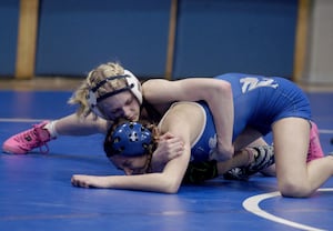 Photos: Wrestling at Newman High School with Newman, Princeton and Lena-Winslow