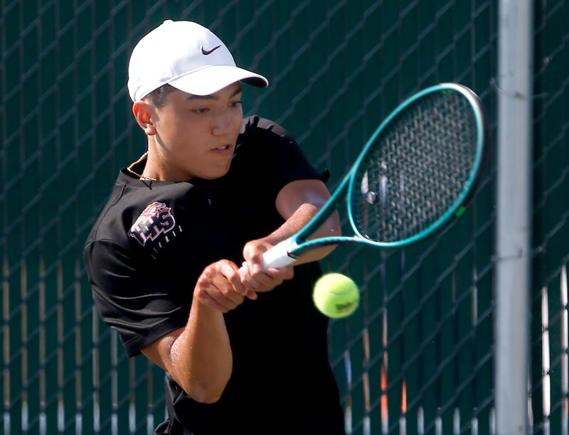 Huntley’s Will Geske returns the ball as he competes in the Class 2A Boys State Tennis Tournament on Thursday, May 23, 2024, at Hersey High School in Arlington Heights.