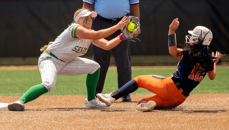 Seneca’s Emma Mino tags out Carterville's Audrina Sloan trying to steal second Saturday, June 6, 2026, in the class 2A state softball title game.