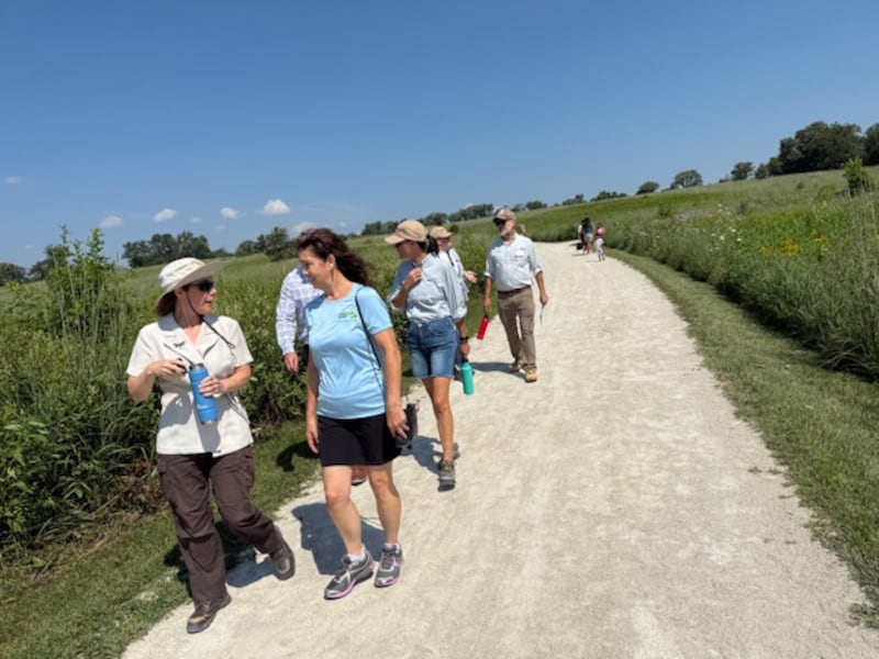 Juli Mason, ecological management supervisor for the Forest Preserve District of Will County, speaks to the importance of wetlands preservation at a program marking the 20th anniversary of the Hadley Valley Preserve restoration project in Joliet on Aug. 8, 2025.